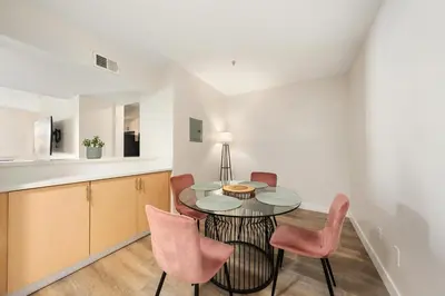 a kitchen and dining room with a table and chairs at The Blossom-Modern 1BR Getaway in Marina Walk to Water&Restaurants in Los Angeles