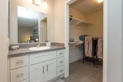 a bathroom with a sink and a mirror at Hollywood 1Bed Apt w Rooftop pool & Panoramic View in Los Angeles