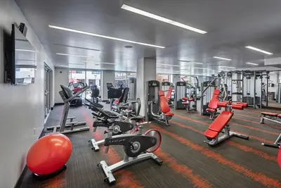 a gym with a lot of cardio equipment in it at Beautiful Studio in West Hollywood in Los Angeles