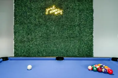 a pool table with the words happy birthday on it at Family Getaway Villa to Disneyland! Sleeps up to 22 persons w Game Room, Pool Table & EV Friendly in Midway City