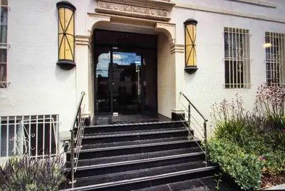 a set of stairs leading to a building at Murano Studio in the Heart of Koreatown in Los Angeles