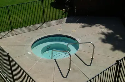 an overhead view of a pool on a patio at Best Economy Inn & Suites in Bakersfield