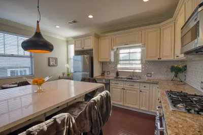a kitchen with a large island with a counter top at Luxury 2 bed 1 bath in Torrance