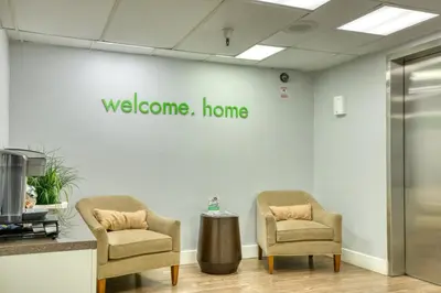 a waiting room with two chairs and a welcome home sign at Pasadena 1BR w gym pool nr Colorado Ave LAX-861 in Pasadena