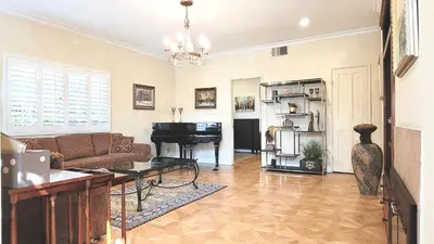 a living room with a couch and a piano at CASA LUX MONICA Prime Santa Monica Luxury Home ONE-OF-A-KIND in Los Angeles