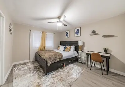 a bedroom with a bed and a desk at Charming pet friendly family getaway Santa Clarita in Santa Clarita