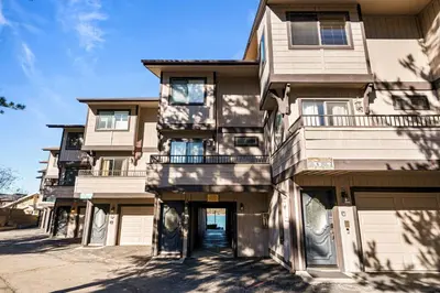 a large apartment building with its door open at Lakehouse Retreat - Community Pool, Lake Views and Walk to Village! in Big Bear Lake