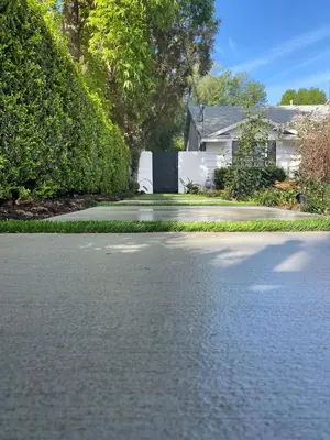 an empty street with a house and trees at Guest house with private entry and large pool in Los Angeles