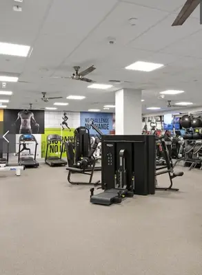 a gym with lots of exercise equipment in a room at 1 bedroom. 2 beds. 1 bath with Balcony in Los Angeles