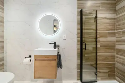 a bathroom with a sink and a shower at Newly Remodeled Home in the Heart of Orange County in Midway City