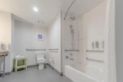 a bathroom with a tub and a toilet and a shower at Hampton Inn By Hilton Santa Clarita-Valencia in Santa Clarita