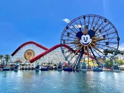 a ferris wheel with a face on it in the water at Scandinavian 2BR, 2Bath Townhome, Pet & Kid Friendly, Free Parking, 10min to Venice Beach! in Los Angeles