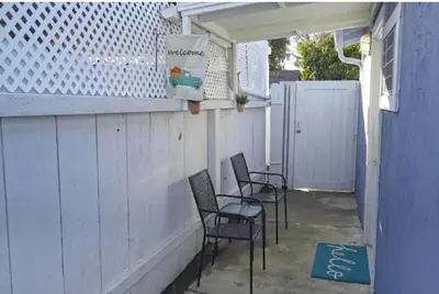 a row of chairs sitting on the side of a building at 2 Miles to Disneyland -FREE Parking! In Anaheim CA in Anaheim