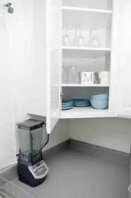a kitchen counter with a blender in a cabinet at 2 Miles to Disneyland -FREE Parking! In Anaheim CA in Anaheim