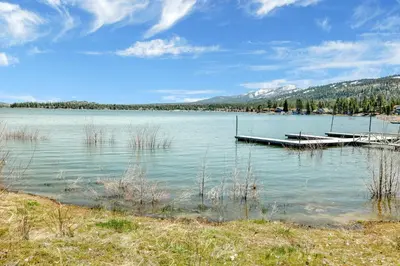 a dock in the middle of a large lake at FRANK'S OLD BEAR #149 in Big Bear Lake
