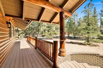 a porch of a house with a wooden deck at All about fun #1149 in Big Bear Lake