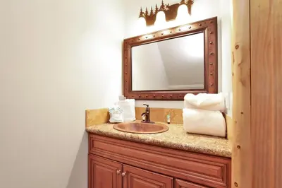 a bathroom with a sink and a mirror at Eagle ridge views #1648 in Big Bear Lake