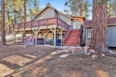 a home with a large deck on a house at Lake shore #012 in Big Bear Lake