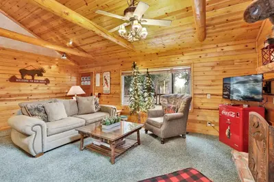 a living room with a couch and two chairs and a table at Timber pines chalet #2417 in Big Bear Lake