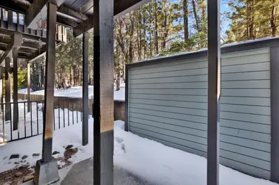 a garage door on a house in the snow at Switzerland slopes #2125 in Big Bear Lake
