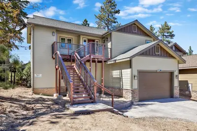 a house with a staircase in front of it at The pines retreat #2336 in Big Bear Lake