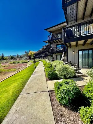 a building with a walkway in front of it at Forest shores lake view condo #2250 in Big Bear Lake