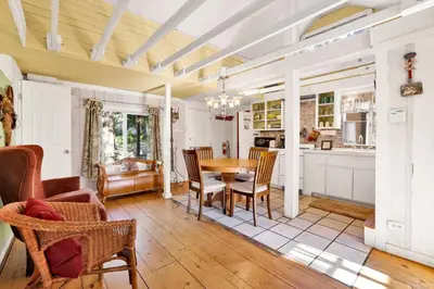a kitchen and dining room with a table and chairs at Pines 23 #1438 in Big Bear Lake