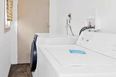 a laundry room with a washer and dryer at Shore acres lodge #451 in Big Bear Lake