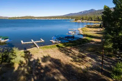 a view of a lake with boats in the water at Lupine #106 in Big Bear Lake