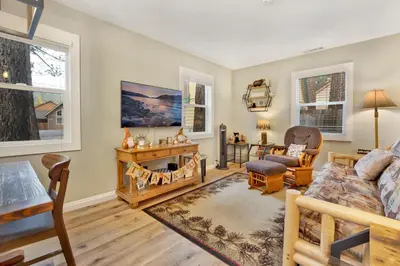a living room with a couch and a chair at Beary cozy cabin #2315 in Big Bear Lake