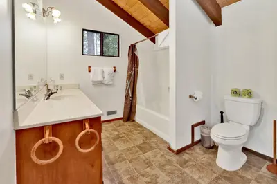 a bathroom with a sink and a toilet at Lakeview fishing house #121 in Big Bear Lake