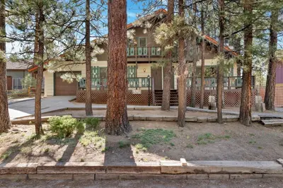 an exterior view of a house with trees at Moose creek chalet #1237 in Big Bear Lake