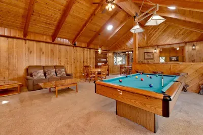 a living room with a pool table in it at Moose creek chalet #1237 in Big Bear Lake