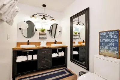 a bathroom with two sinks and a mirror at Blue bear chalet #2045 in Big Bear Lake