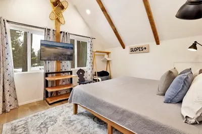 a bedroom with a bed and a window at Blue bear chalet #2045 in Big Bear Lake