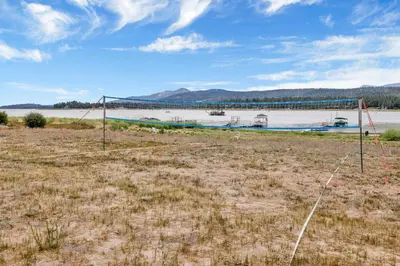 a large body of water with boats in a field at North shore chalet #2173 in Fawnskin