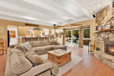 a living room with a couch and a fireplace at Cozy up to summit #1651 in Big Bear Lake