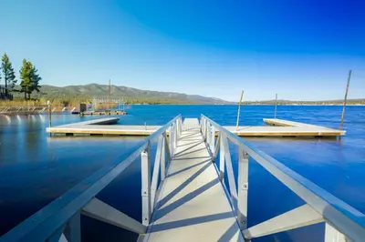 a dock in the middle of a large body of water at Juniper #105 in Big Bear Lake