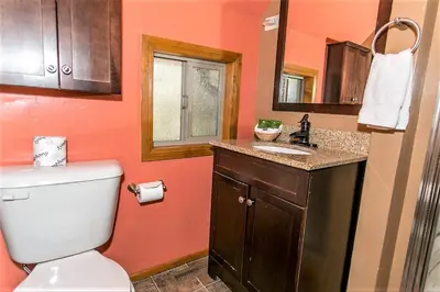 a bathroom with a toilet and a sink at Grandpas axe # 1775 in Big Bear Lake