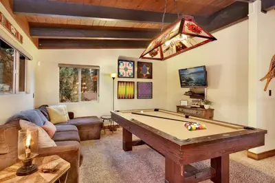 a living room with a pool table at Eagle point lodge #2080 in Big Bear Lake