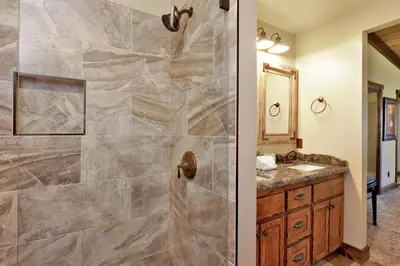 a bathroom with a shower and a sink at Eagle point lodge #2080 in Big Bear Lake