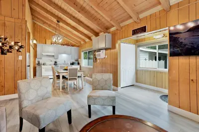 a kitchen and dining room with a table and chairs at Sweet retreat combo #2334 in Big Bear Lake
