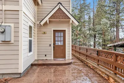 a front door of a house with a wooden fence at Mount berkley #2367 in Big Bear Lake