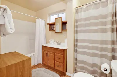 a bathroom with a shower and a sink and a toilet at Mount berkley #2367 in Big Bear Lake