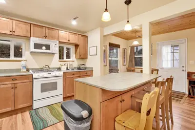 a kitchen with wooden cabinets and a large island at Mount berkley #2367 in Big Bear Lake