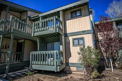 a apartment building with a balcony and a porch at Boulder creek #1417 in Big Bear Lake