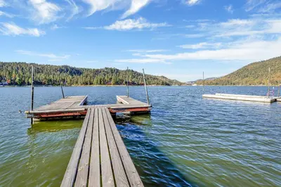 a dock in the middle of a body of water at Fishermans paradise #1792 in Big Bear Lake