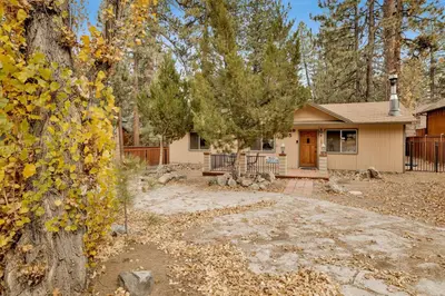 a home in the woods with a yard at POPKO'S PLACE #1426 in Big Bear Lake
