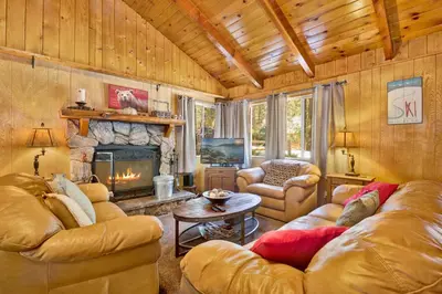 a living room with two couches and a fireplace at Pine cone cottage #2191 in Big Bear Lake