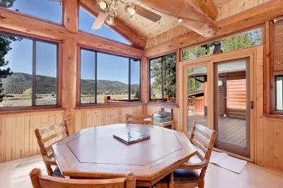 a dining room with a table and chairs at The alps lodge #2142 in Big Bear Lake